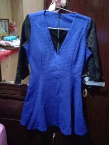 woolen top with net sleeves and back zip i used only once because it has deep neck from front and becoz of size issue