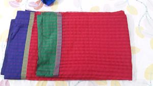 Red colour saree with multi coloured boarders,  fe