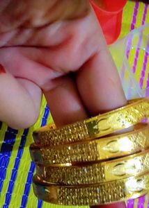 Set of Gold Bangle Bracelets