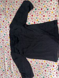 black top with ruffles sleeves