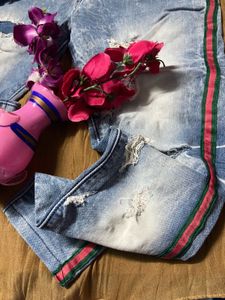 Ripped Jeans with Striped Detail