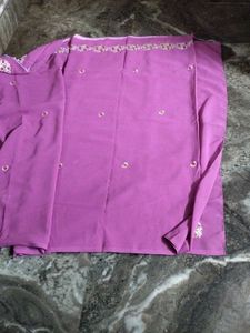 Saree with maching Blouse.