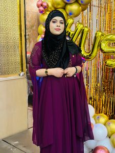Purple Gown With Long Sleeves