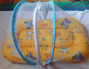 Baby bed with mosquito net