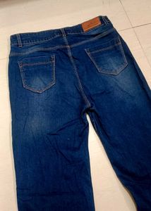 Ripped Flared Leg Jeans