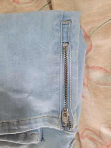 Ripped Light Wash Denim Jeans