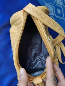 Stylish Mustard Circular Sides Sling Bag