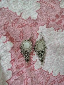 Silver tone bracelet and earrings