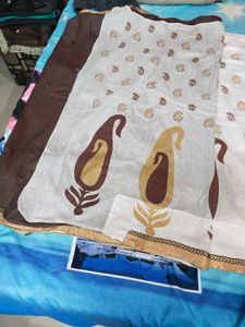 Preety Brown N White Saree