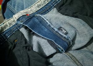 Distressed Jeans with Red and White Stripe