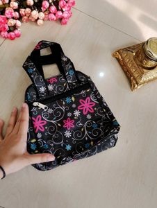 2. Black Floral Handbag