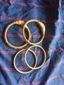 Elegant Gold Tone Bangles - Set of Two