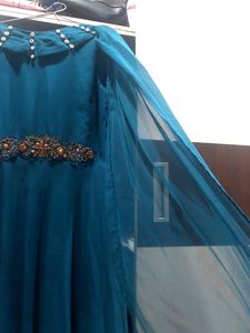 Beautiful Dress With The Attached Dupatta And Detailing On Waist And Neck