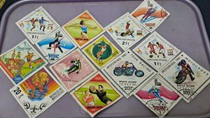 14 RARE DIAMOND SHAPE SPORTS STAMPS