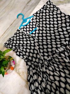 Flared Black Top With Teardrop Detail
