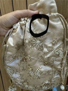 adara khan Zari  Potli ( receipt attached)