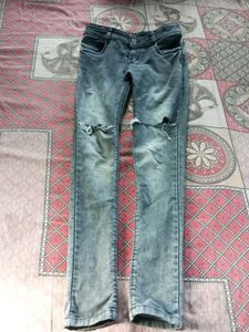 Ripped Knee Jeans