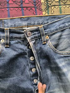 Worn Blue Denim Jeans