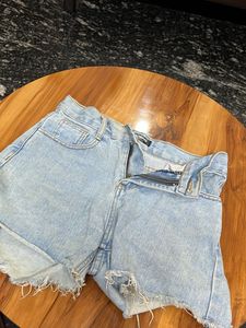 denim with little stains, which are removeable