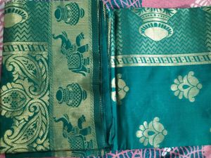 Teal Green Saree with Golden Zari Work