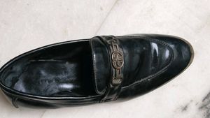 Gucci Shoes And A Pair Of Sports Shoe