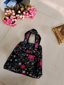 2. Black Floral Handbag