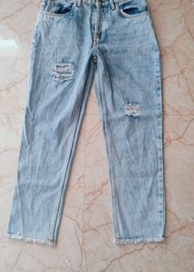 Ankle Length Torn Jeans From Zudio