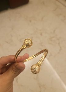 Twisting Gold Color Bangle