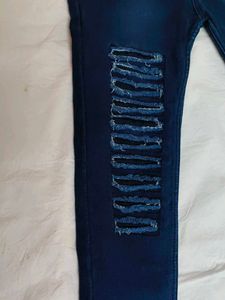 Ripped High-Waisted Jeans