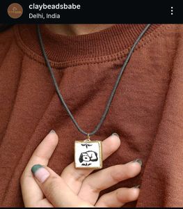 Handcrafted Dog clay Pendant