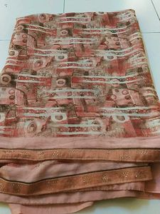 Elegant Orange Patterned Saree