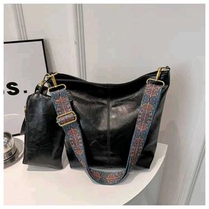 Grey Handbag with Colorful Strap
