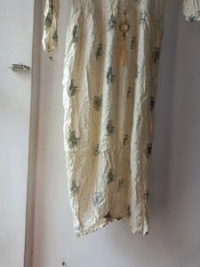 This Is A cream Colour Straight Kurta