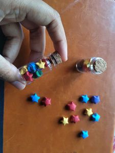 Glass Jars Filled With Paper Stars