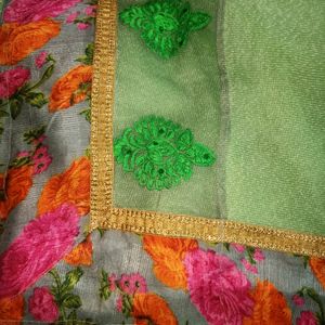 AMARA PISTA GREEN NET GEORGETTE PARTY WEAR SAREE