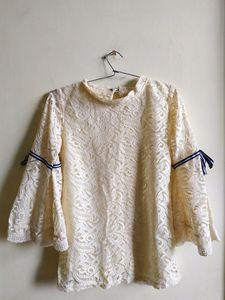 Top ,white cream in colour,