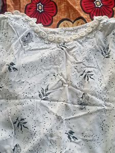 Chic White Leaf Print Top with Crochet Neckline