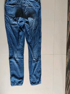 Distressed Blue Denim Jeans