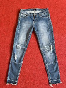Distressed Denim Jeans