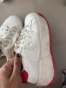 White Sneakers with Unique Design
