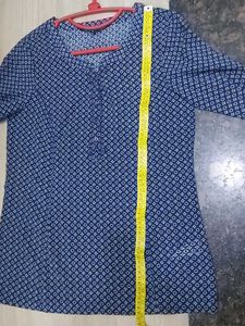 Blue Printed Georgette Top With Fold Up Sleeves.
