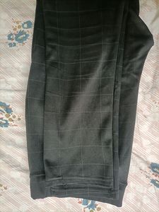 Black stretchable pants can fit 30,32,34 waist