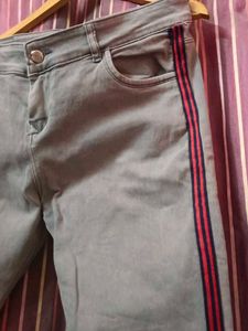 Grey Jeans with Red Stripe