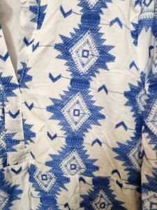 White Knee-Length One-Piece with Blue Embroidery