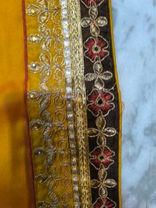 Elegant Yellow and Brown Embroidered Saree