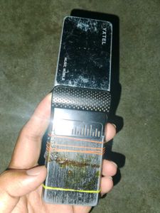 YXTEL flip phone