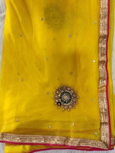 Elegant Yellow Saree with Pearl Details