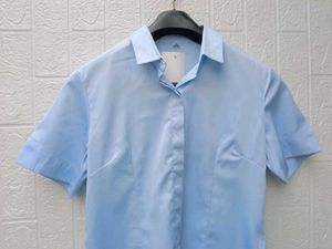New with tag Cute Light Blue Button-Up Shirt
