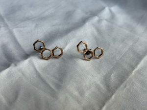 Honeycomb shaped golden studs earrings