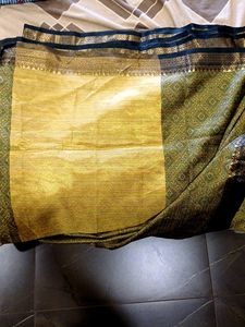 Saree With Black And Golden Border